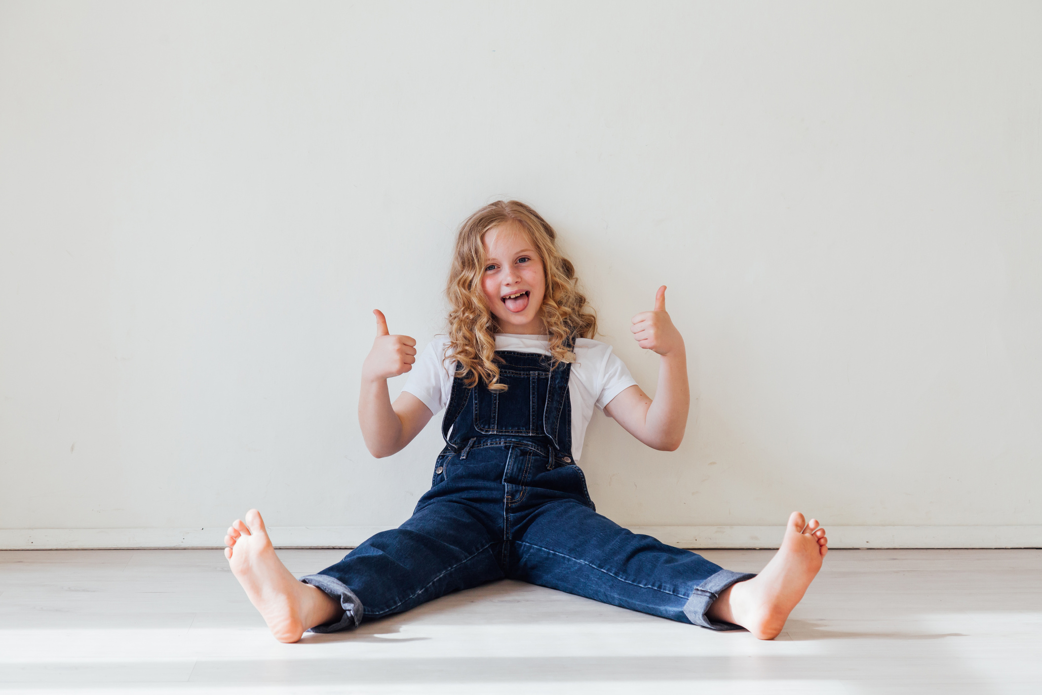 beautiful girl 10 years old in denim clothes