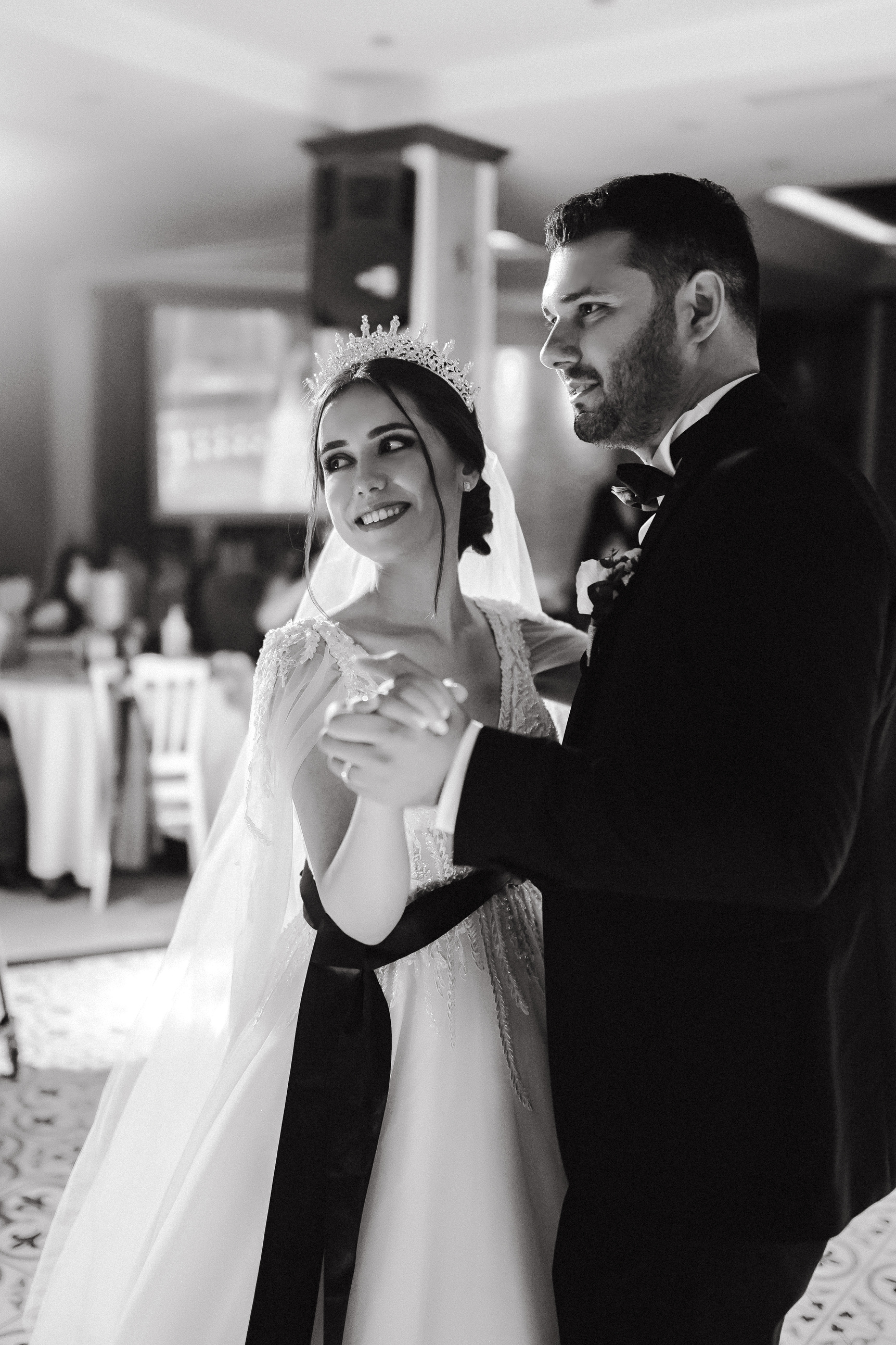 Black and White Photo of Bride and Groom Dancing at Reception